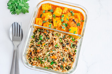 Indian Vegetarian Combo Meal of Fried Rice and Paneer Butter Masala in a Lunch Box