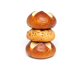 Bakery product assortment kaiser roll bun with linseeds and sesame, traditional German laugenbrot, Bavarian pretzel rolls lye bread isolated on a white background
