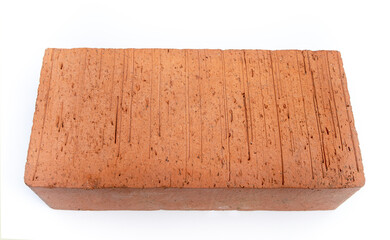 Full-bodied red brick on white isolate. Red building brick.