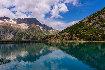 Fototapeta na wymiar Panoramic view of the Gelmer reservoir in Switzerland.