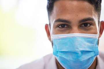 Businessman, covid or face mask in office, company or startup in government law compliance, healthcare safety or global virus stop. Zoom, portrait or employee worker in covid 19 security for wellness