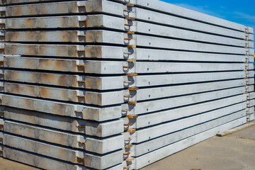 Concrete slabs stacked. Material for construction. Background for supplier. Reinforced concrete floors..