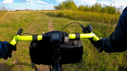 Gravel bicycle ride on the road in the summer season