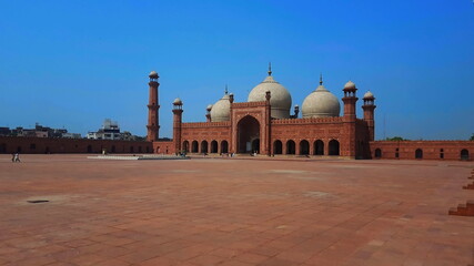 Fototapeta premium Badshahi Mosque, - June, 25, 2018: Lahore, Pakistan. Also Emperors Mosque, was built in 1673 by the Mughal Emperor Aurangzeb. It is one of the city best known landmark, and a major tourist attraction.