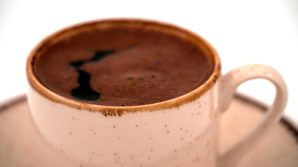 Turkish coffee with a stylish ceramic cup on an isolated background 