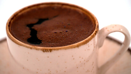 Turkish coffee with a stylish ceramic cup on an isolated background 