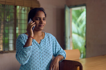 Indian woman talking on the smart phone