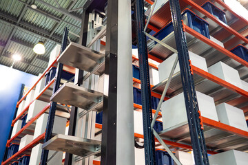 Vertical lift. Warehouse building interior. Warehouse technologies. Fulfillment center machine....