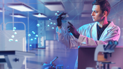 Man is scientist. Young employee of scientific laboratory. Medical student examines test tube. Man...