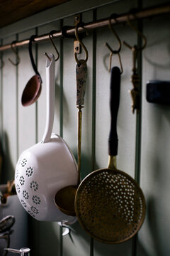 Ladle and strainers hanging on hook