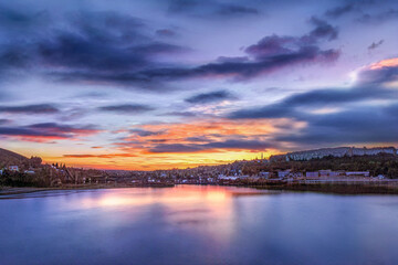 Fototapeta premium sunset over the holiday town