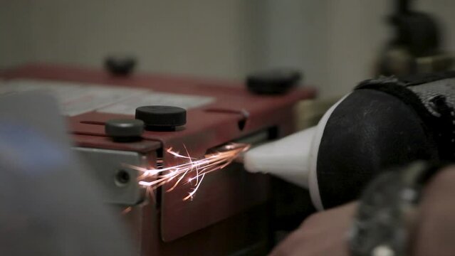 a clip about sharpening skates and sparks flying. hd