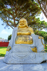 detail of buddha statues posed outdoors