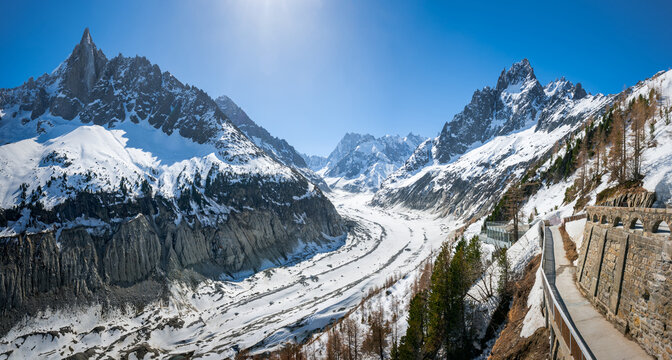 Mer de Glace glacier with view of Les Drus peak, Grandes Jorasses (center) and Grands Charmoz Needle (right). Vallee Blanche (winter ski resort) of the Mont Blanc massif, Alps, Haute-Savoie, France