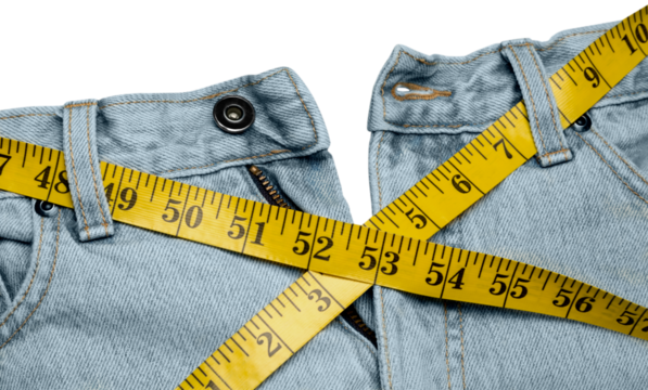 Jeans with centimeter in weight loss concept