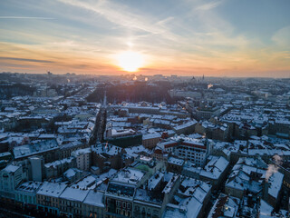 Fototapeta na wymiar aerial view of sunset above the winter Lviv city