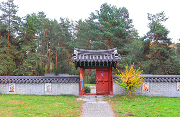Korean traditional garden in Hryshka National Botanical Garden of the National Academy of Sciences of Ukraine in autumn time in Kyiv	
