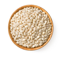 Highland barley in the wooden bowl, isolated on white background, top view.