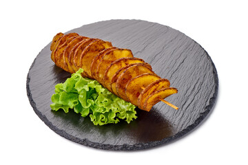 Street food. A spiral fried potatoes, isolated on white background.