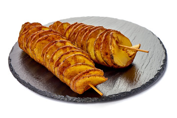 Street food. A spiral fried potatoes, isolated on white background.