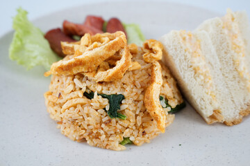 slice of bread with fried rice and egg on close up shot 