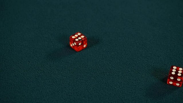 Rolling two red dice and getting same numbers six on both, Slow motion 