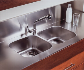 Detail of a steel sink in a modern kitchen