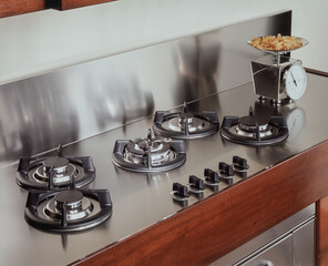 Steel hob detail of a modern kitchen