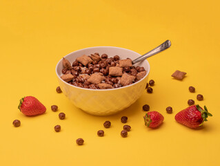 breakfast cereals with spoon and strawberry