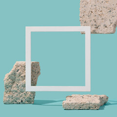Square frame with concrete slabs against the teal background. Modern, urban construction copy space