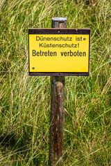 beach erosion control sign in Germany