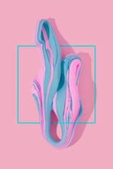 Abstract pink and blue soft clay shape. Pastel pink background. Candy colors with square frame