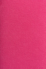 Fototapeta premium Full frame in burgundy short pile felt, vertical arrangement.