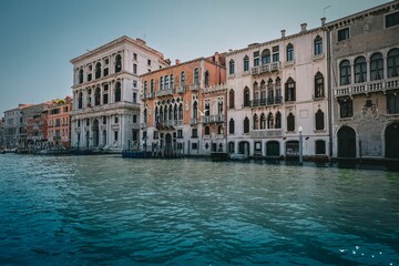 Naklejka premium Line of ancient buildings by the Gand Canal in Venice, Italy