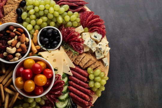  The traditional Spanish choice is Tapas A lavish charcuterie board brimming with an assortment of nuts, fruits, and meats, inviting a communal gastronomic adventure. Perfect for social gatherings