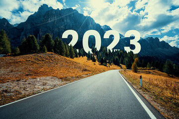 2023 New Year road trip travel and future vision concept . Nature landscape with highway road...