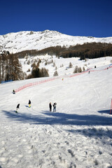 Fototapeta na wymiar Skiing track in the mountains of Valtellina, Italy. 