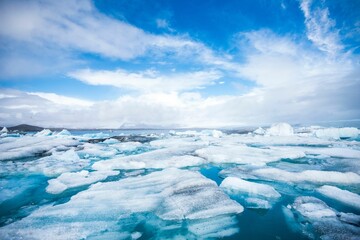 Beautiful shot of the Jokulsarlon Glacial Lake Iceland with a cloudscape in the background