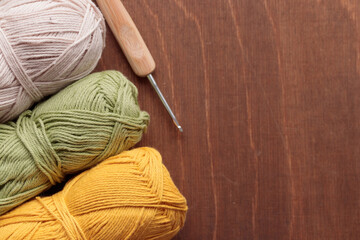 Cotton Yarn Skeins for Crocheting Handmade on a Dark Wooden background