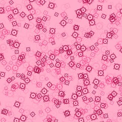 Colorful seamless patterns in the form of circles on the pink background