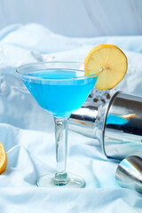 Glass of blue lagoon cocktail