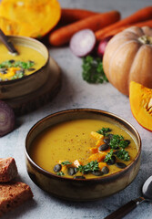 Bowls served with seasonal pumpkin soup