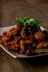 Vertical shot of a dish with crispy chicken
