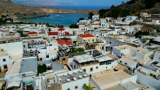 Lindos is a town on the Greek island of Rhodes. It&rsquo;s known for its clifftop acropolis, which features monumental 4th-century gates and reliefs from about 280 B.C.