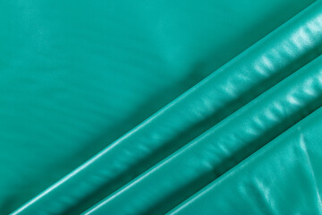 turquoise faux leather folded surface