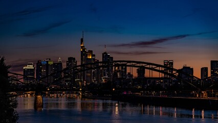 Naklejka premium Beautiful shot of Osthafenbrucke bridge during the evening in Frankfurt, Germany