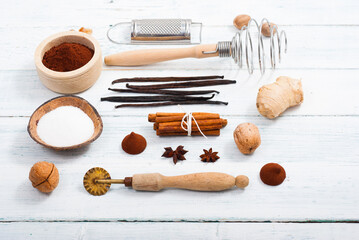 Fototapeta na wymiar dessert ingredients and kitchen utensils on old white wooden table