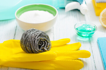 dishwashing products on white wood table