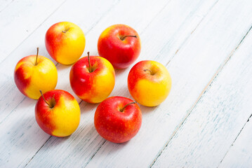 apple fruits on old white wooden table