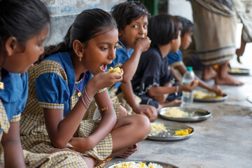 Students having mid day meal at school